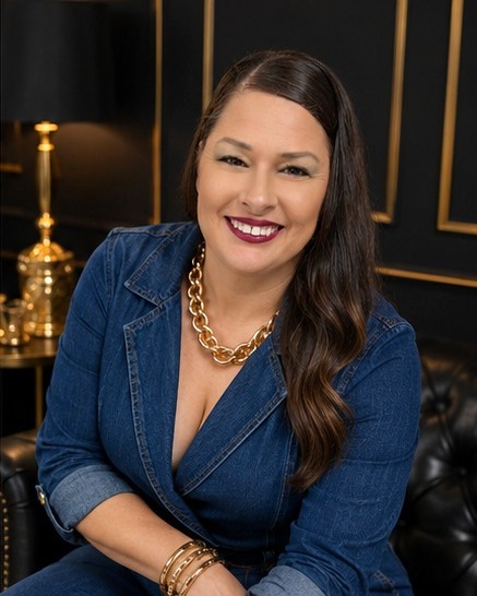 A T.H.R.I.V.E. graduate photographed for a professional portrait