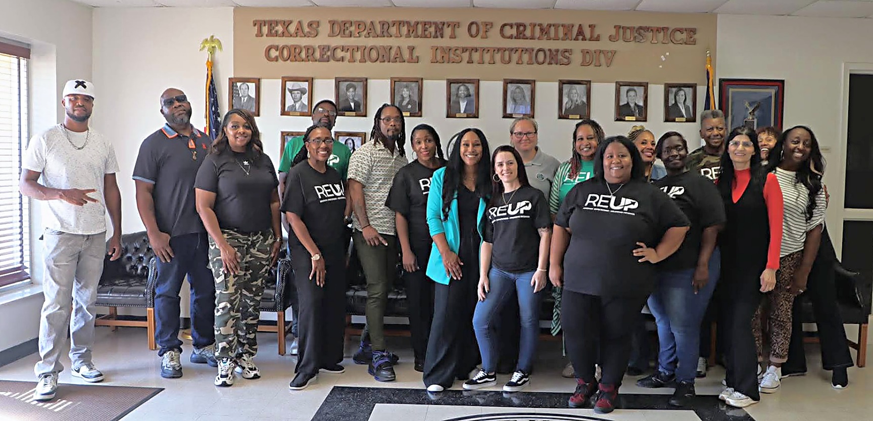 RE-UP Conference participants and program team gathered together inside a correctional facility